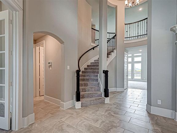 What an entrance! Check out the metal spindle stairway!