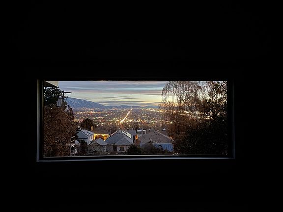 This photo of the south facing window was taken from the back wall of the living room