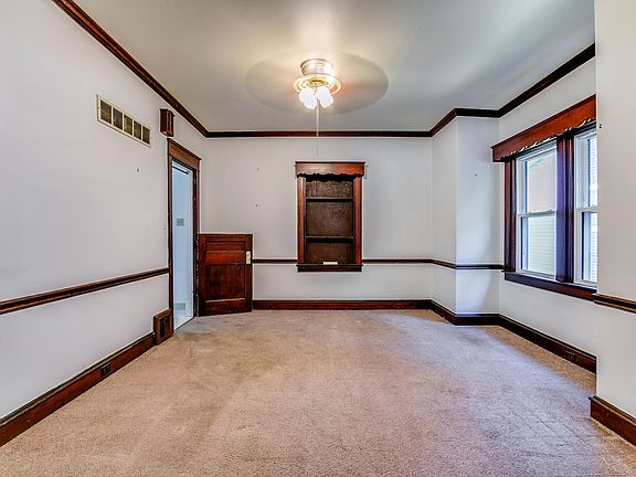 Large dining room with built in shelving