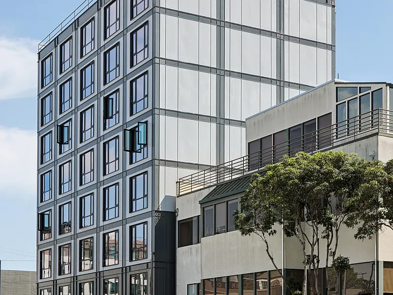 A welcoming exterior with thoughtfully designed architecture and lush surroundings.