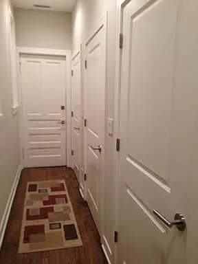 Entrance hallway with closet storage(3).