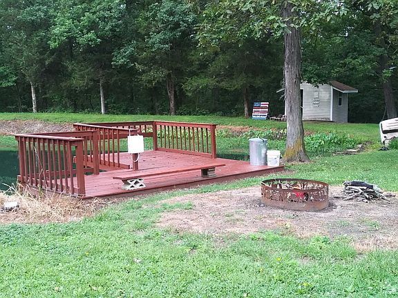 Fire pit ,pond and shed