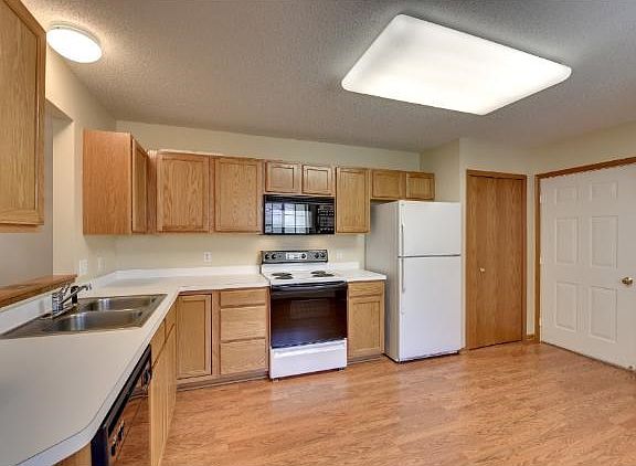 Large kitchen with room for a center island and beakfast nook.