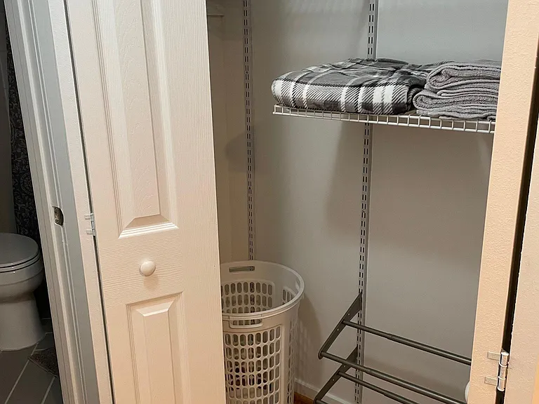 Closet space next to bedroom