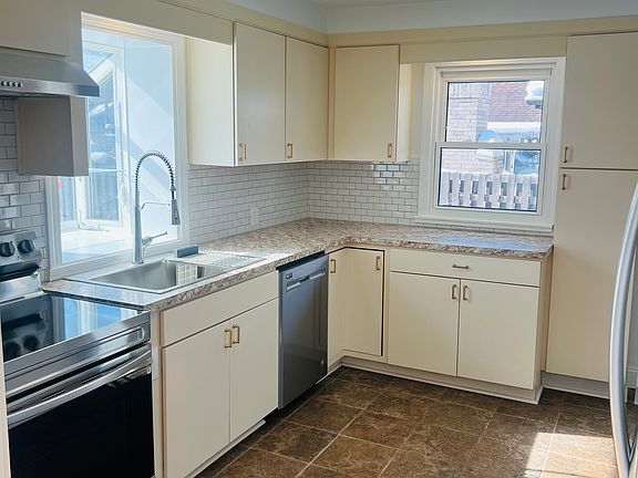 renovated kitchen with new appliances