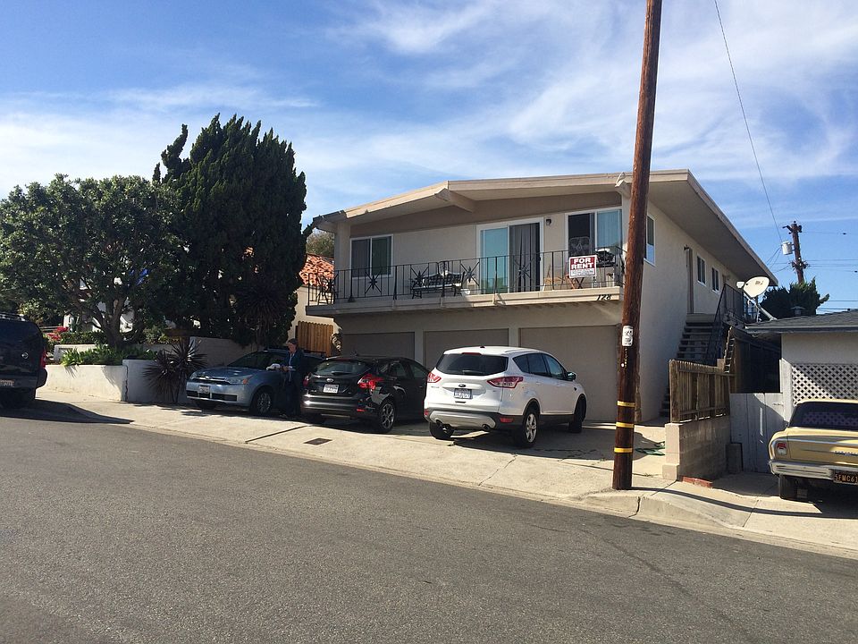 Located in back of Triplex, Lower Level