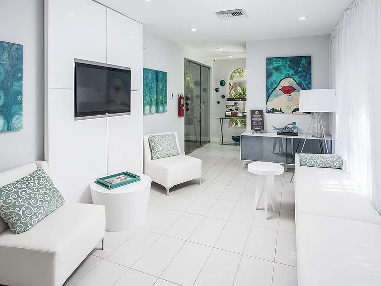 Modern clubhouse featuring a tech bar and Wi-Fi throughout