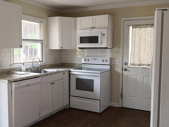 Kitchen renovation 2019. Tile floor, new cabinets & appliances.