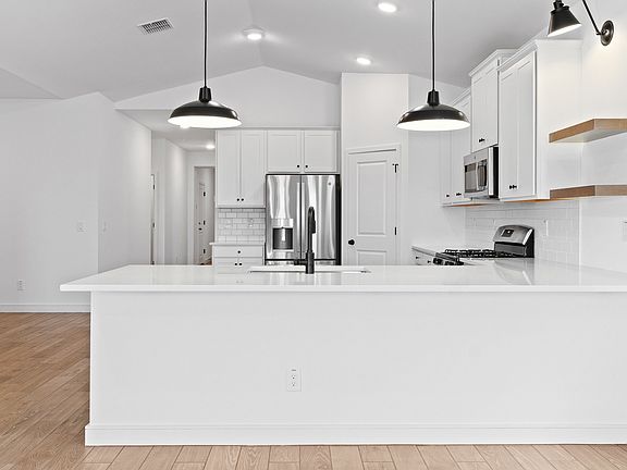 Kitchen with floating shelves
