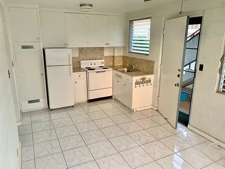 Front view of kitchen and living room