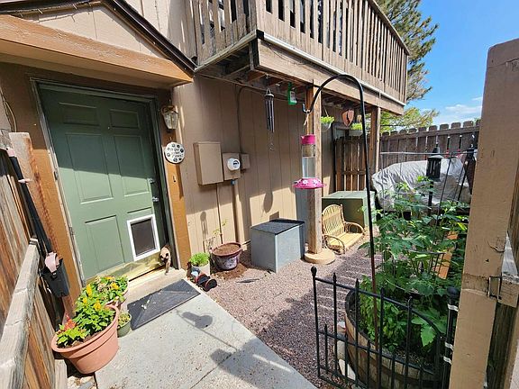 Small yard.Does have 3 different power units that are permanent. There is also a small area where there are some herbs and veggies growing that are boxed in against the fence.