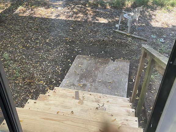 backyard stairs to approx 2 acres lot