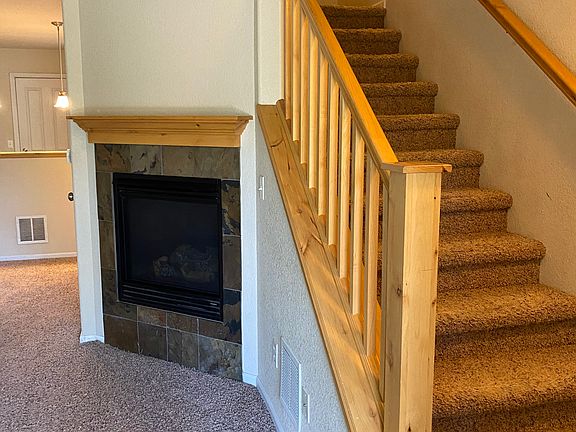 Access upstairs bedroom and bathrooms from the main floor