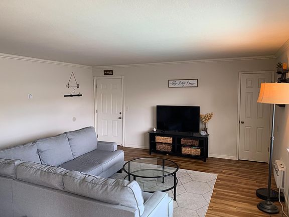 Reverse view of living area, in wall A/C, storage closet.