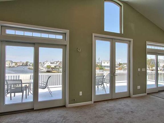 2 sets of sliders off Great room