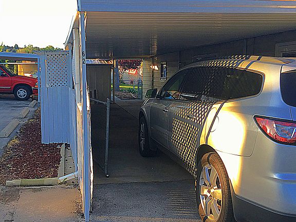 Carport with gate closure