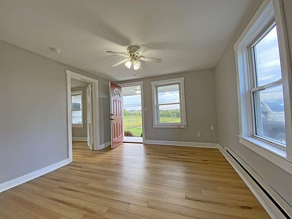 Living Room with Lots of Natural Light. Vinyl Plank Flooring in Home (No Carpet)