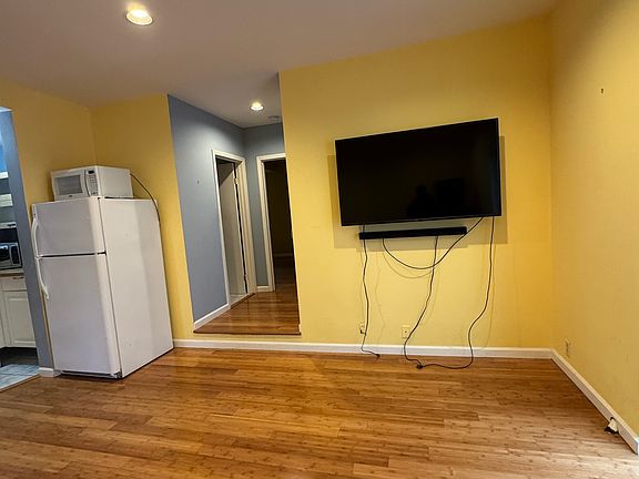 Living room area with Large flat screen TV
