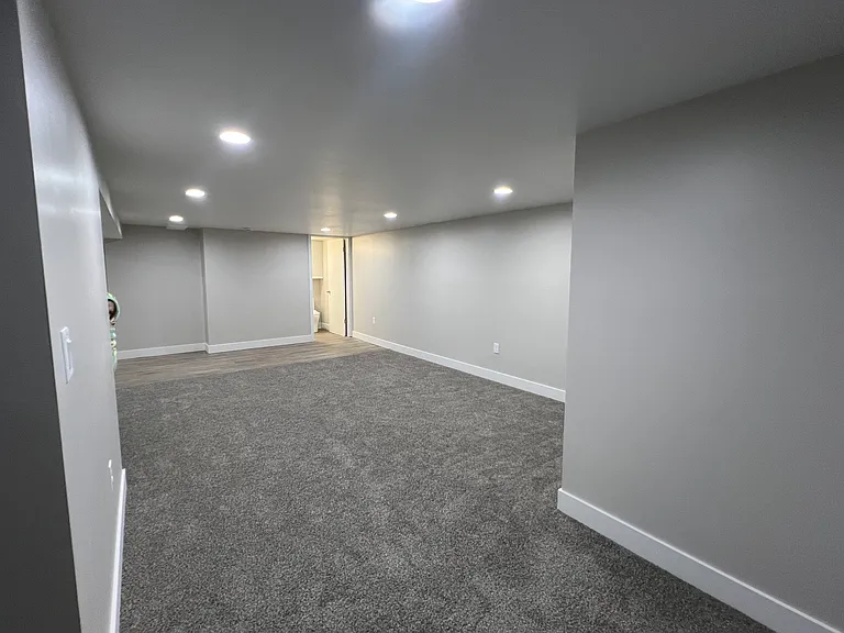 View of living room from bedroom doorway