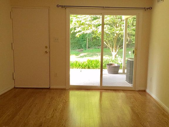 Living Room, Front Door, Front Window To Balcony/Patio