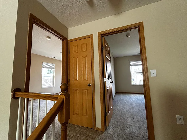 View of Second and Third Bedrooms as well as extra closet in the middle