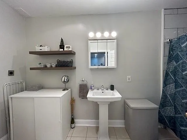 Large bathroom 

Space for Vanity or storage
