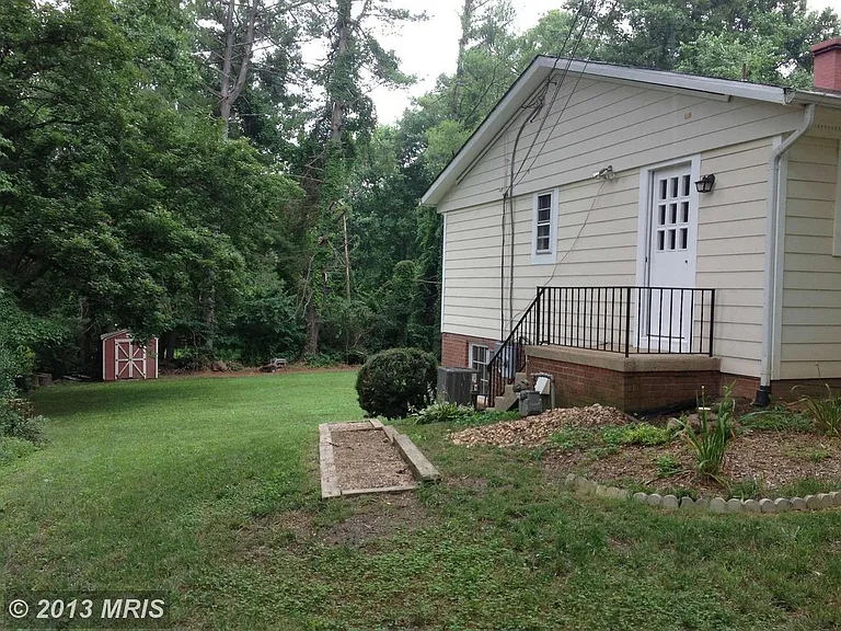 Side yard + walkout from Kitchen door