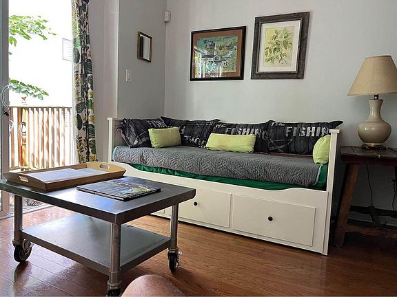 the couch can sleep two comfortably.