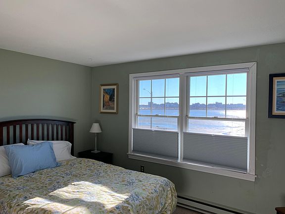 Queen size bed and view from bedroom