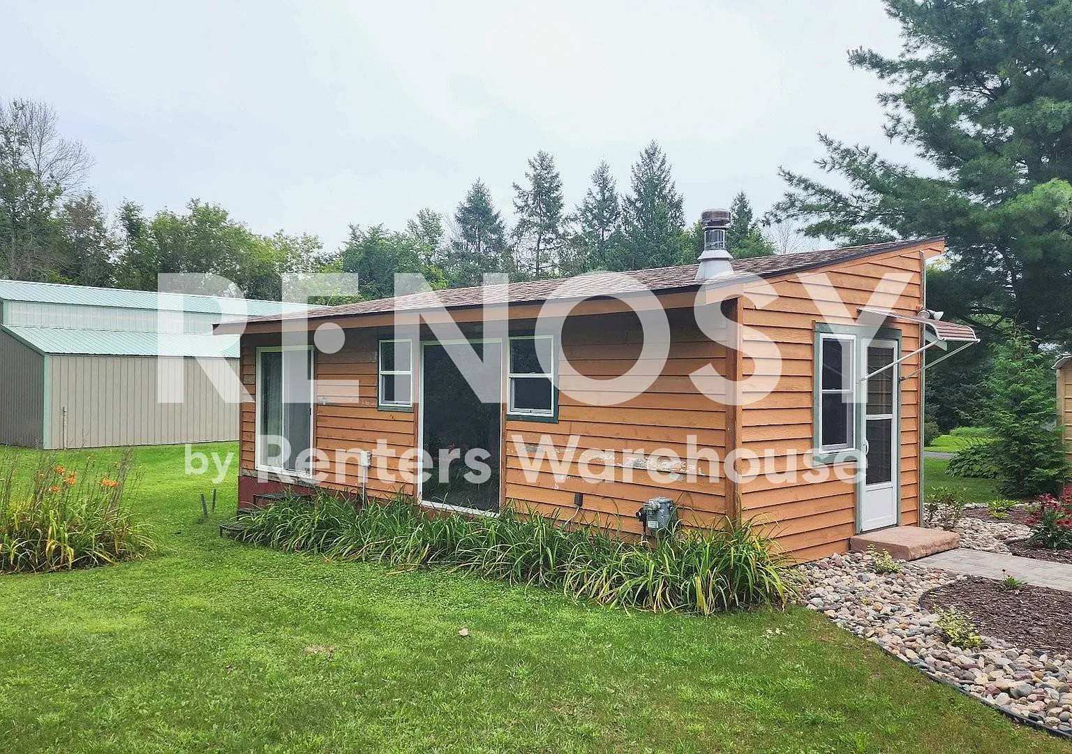 1-Bedroom Home with Wooded Views and Carport in River Falls $1,175/Month — Photo 2