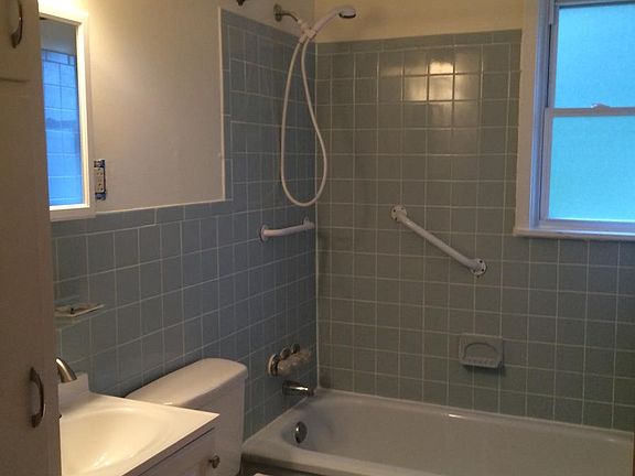 1st Floor Bath - New toilet, medicine cabinet and vanity/fau