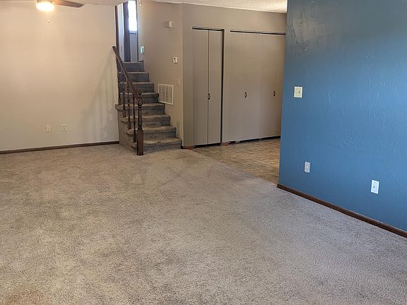 Living room looking to the bedrooms and dining room