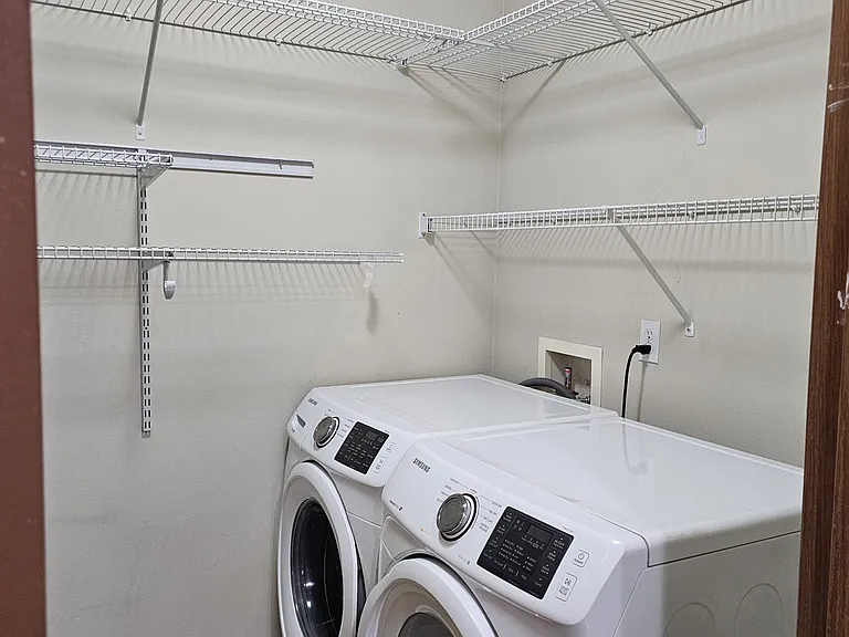 Washer and dryer on level 1 in pantry