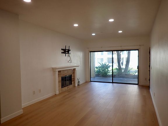 Living room with large slider door in front for tons of natural light