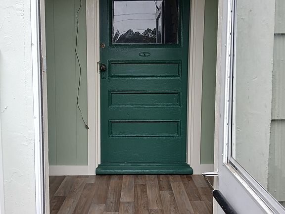 Small enclosed porch.