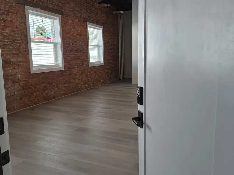 Entrance off rear hallway to apartment