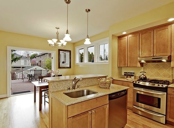 Fabulous kitchen opens up to dining area and full size Trex deck