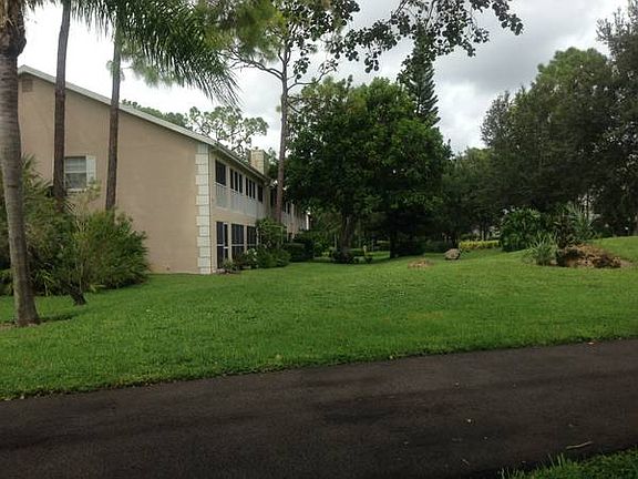 view of condo from path