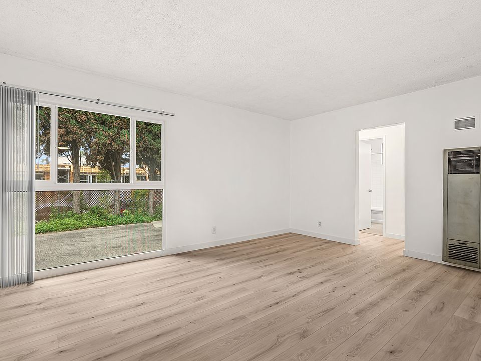 Open plan with big window bottom floor with lots of natural light