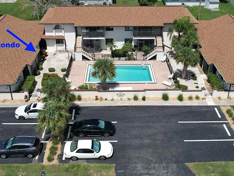 Overview...
Condo complex with 10 condos.
Condo has one designated parking spot, many guest parking spots on premise...