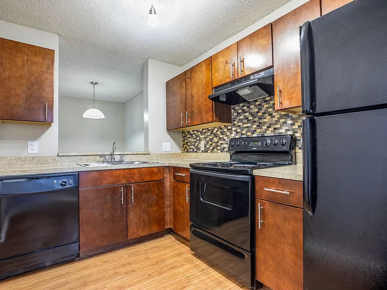 CORAL FALLS APARTMENTS — Photo 32
