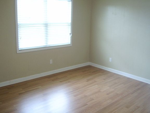 spacious living room with hardwood floor