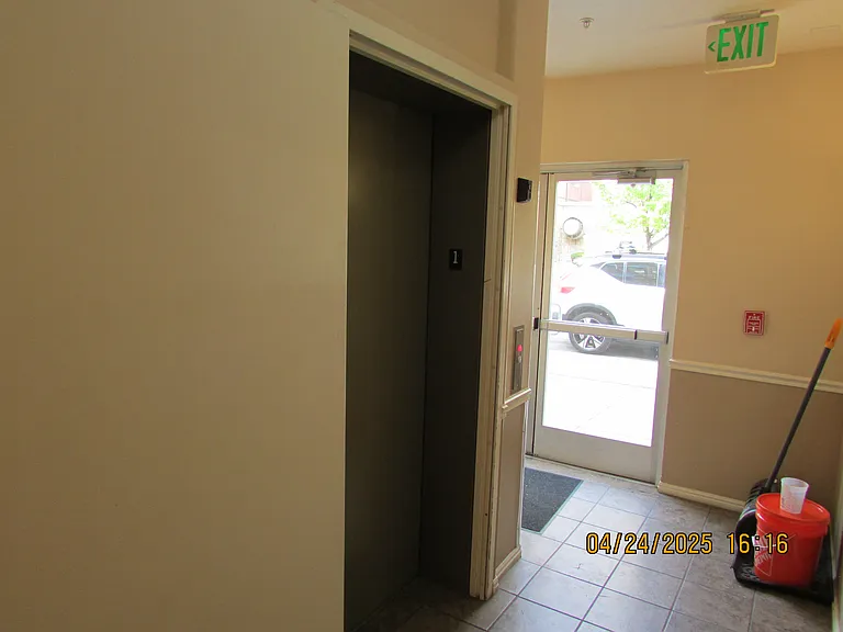 Elevator building access door