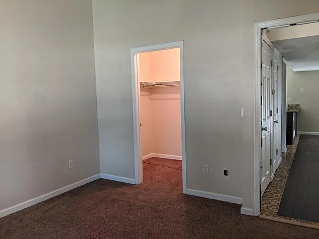 Main Floor Bedroom with Walk-In Closet