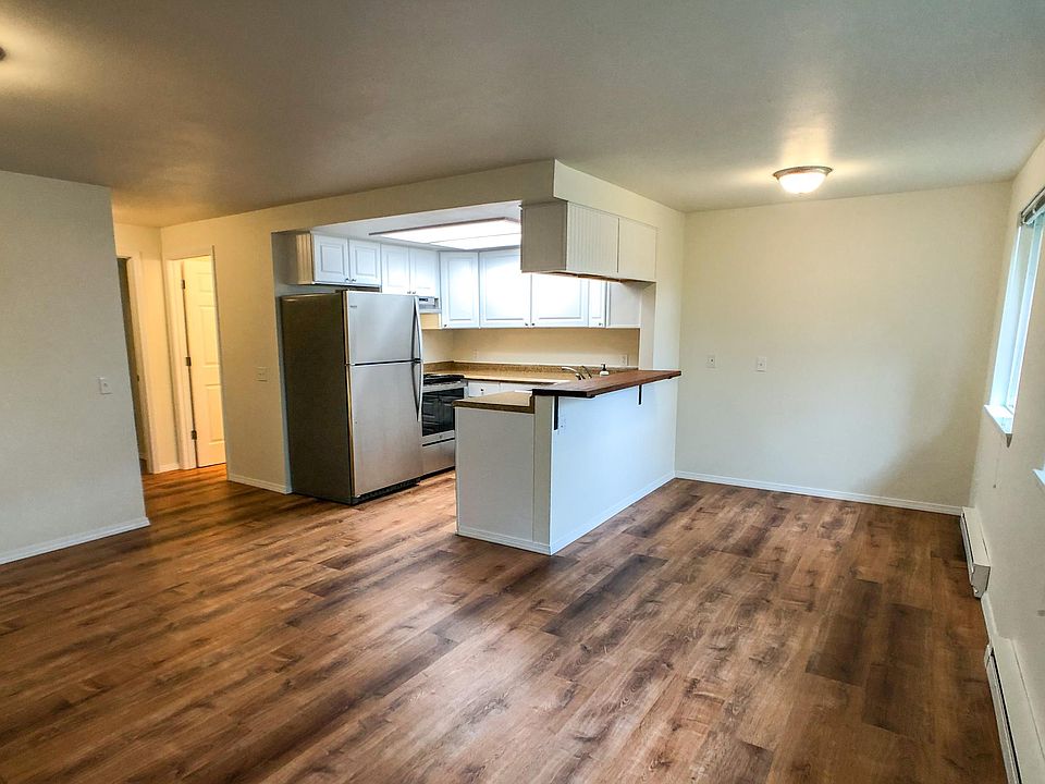 Open floor plan with custom breakfast bar