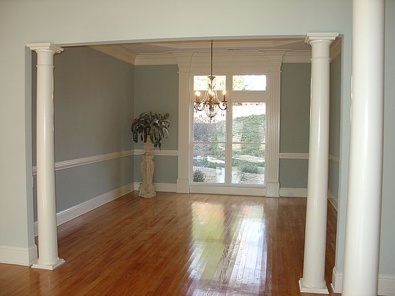 Formal dining room with viw of rear garden.
