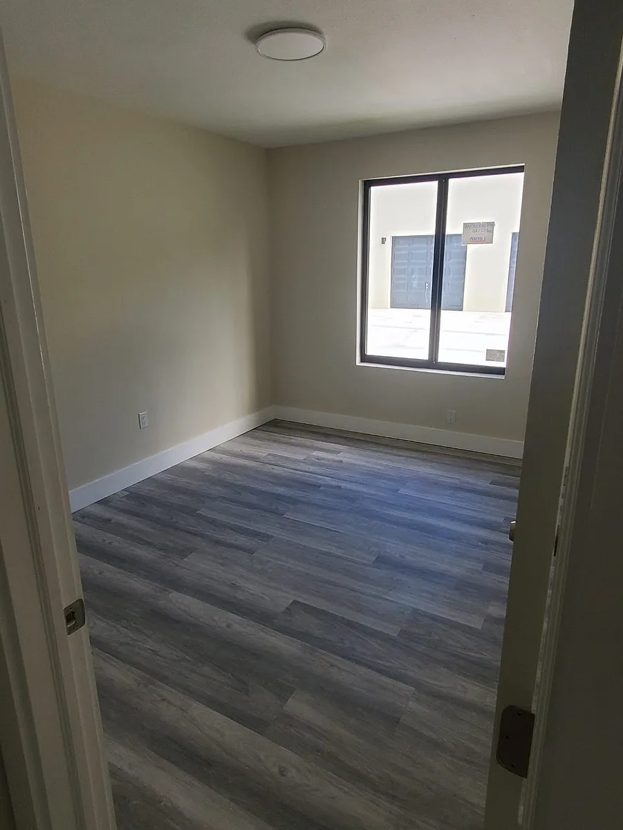 Building Photo - 10091 Kumquat St #1