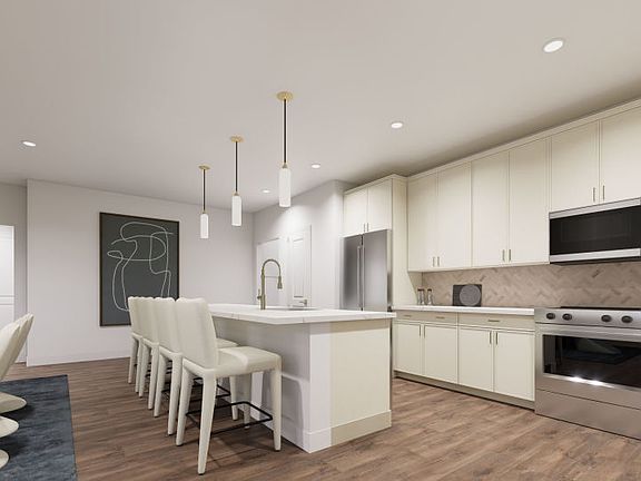 Kitchen with Expansive Island Seats 4 Comfortably