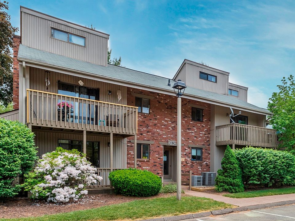 Welcome home to 25 Amato Drive with parking directly in front of your unit!