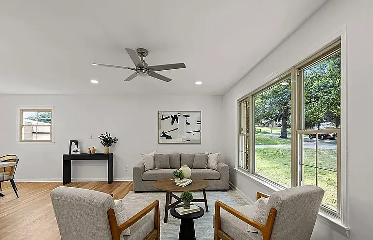 Spacious living room with oversized front windows